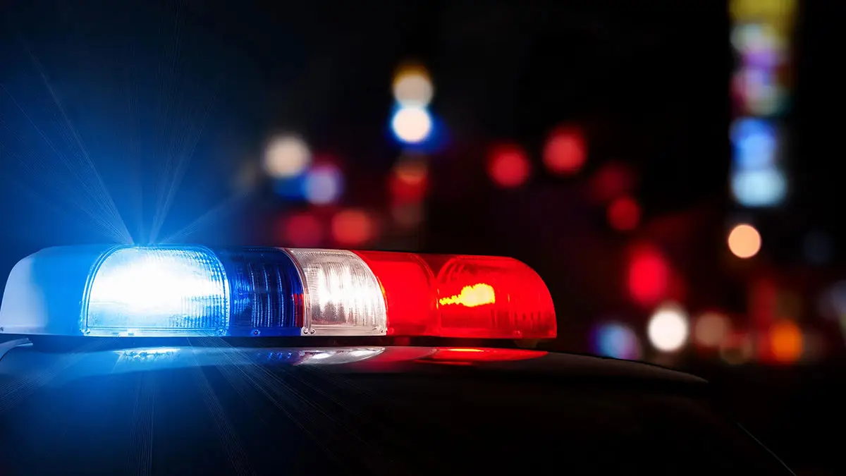 Police car blinkers with red, white, and blue colors.